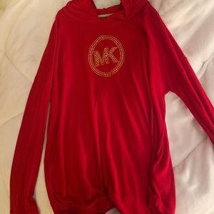 A red Michael Kors hoodie.